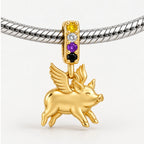 Nonbinary Pride Flying Pig Charm on bracelet view