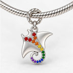 Rainbow Pride Spinning Manta Ray Charm on bracelet view