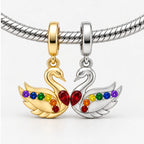 Rainbow Pride Swans Charms on bracelet view