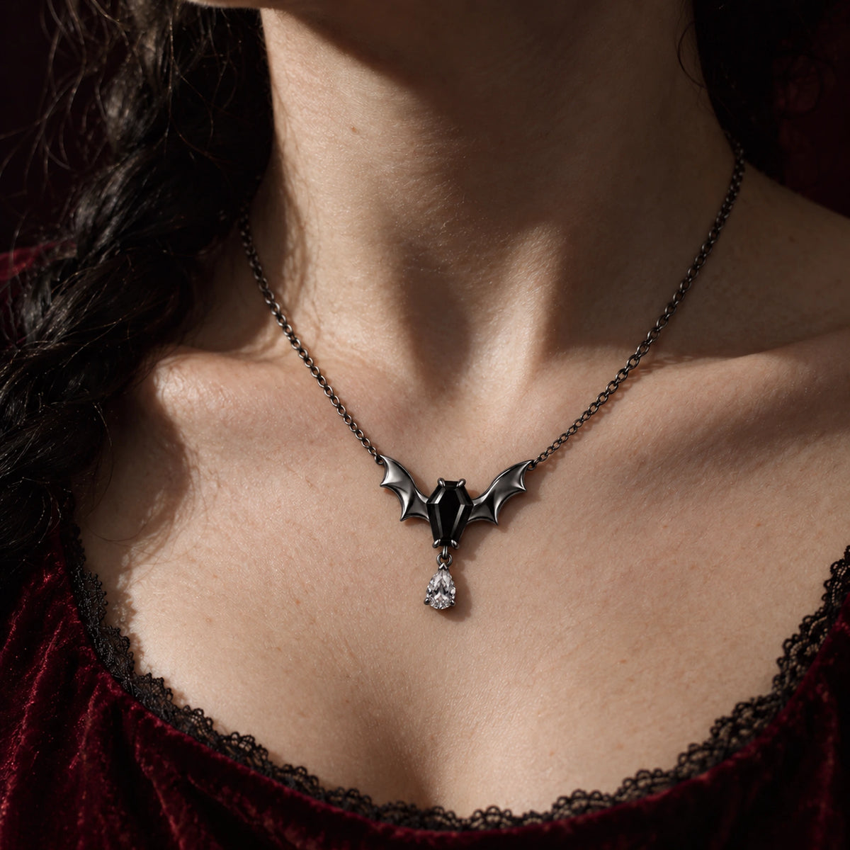 Bat Coffin Pendant Necklace in Royal Black, worn