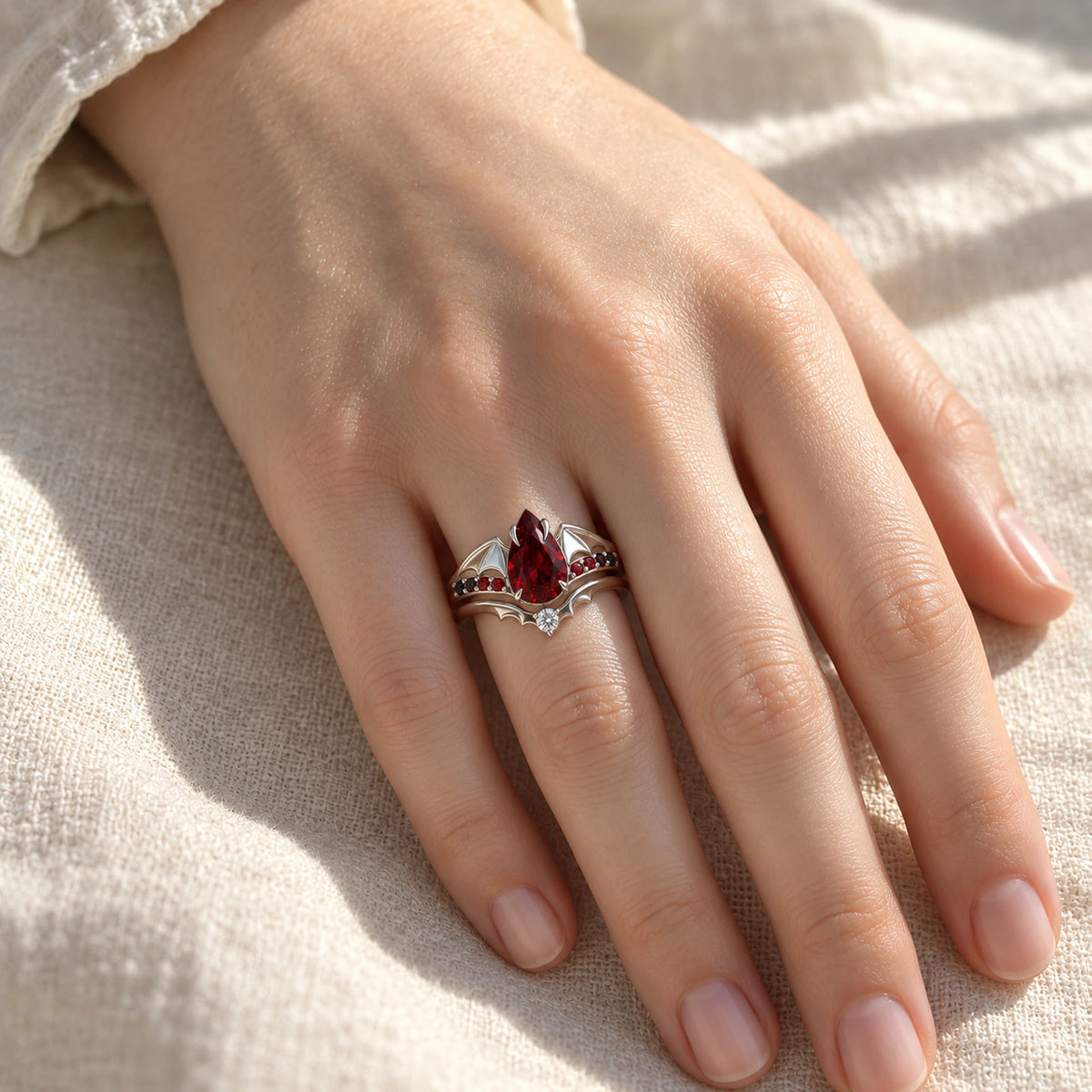 Crimson Wing Stacking Ring Set in Silver, worn