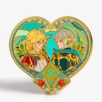 Gold-tone enamel pin of two figures side by side with a glow section, Kaveh x Alhaitham pin by Kraymer Art