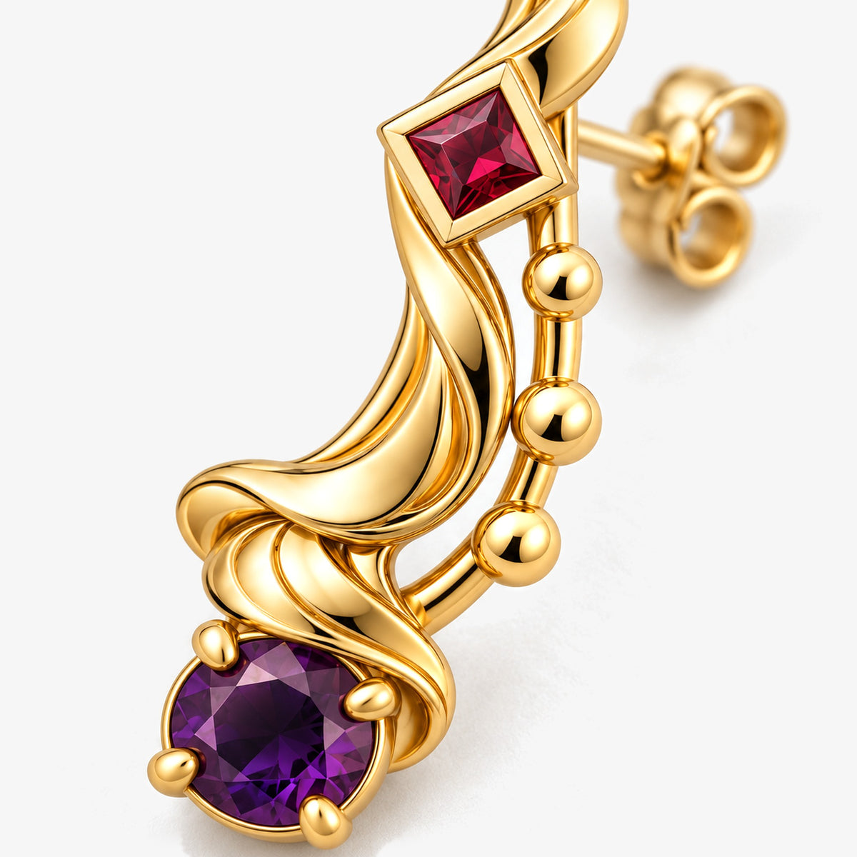 A Thousand Fashions Sash Earrings in gold, close-up