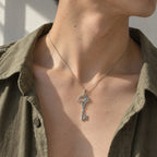 Alhaitham Necklace model wearing the silver pendant