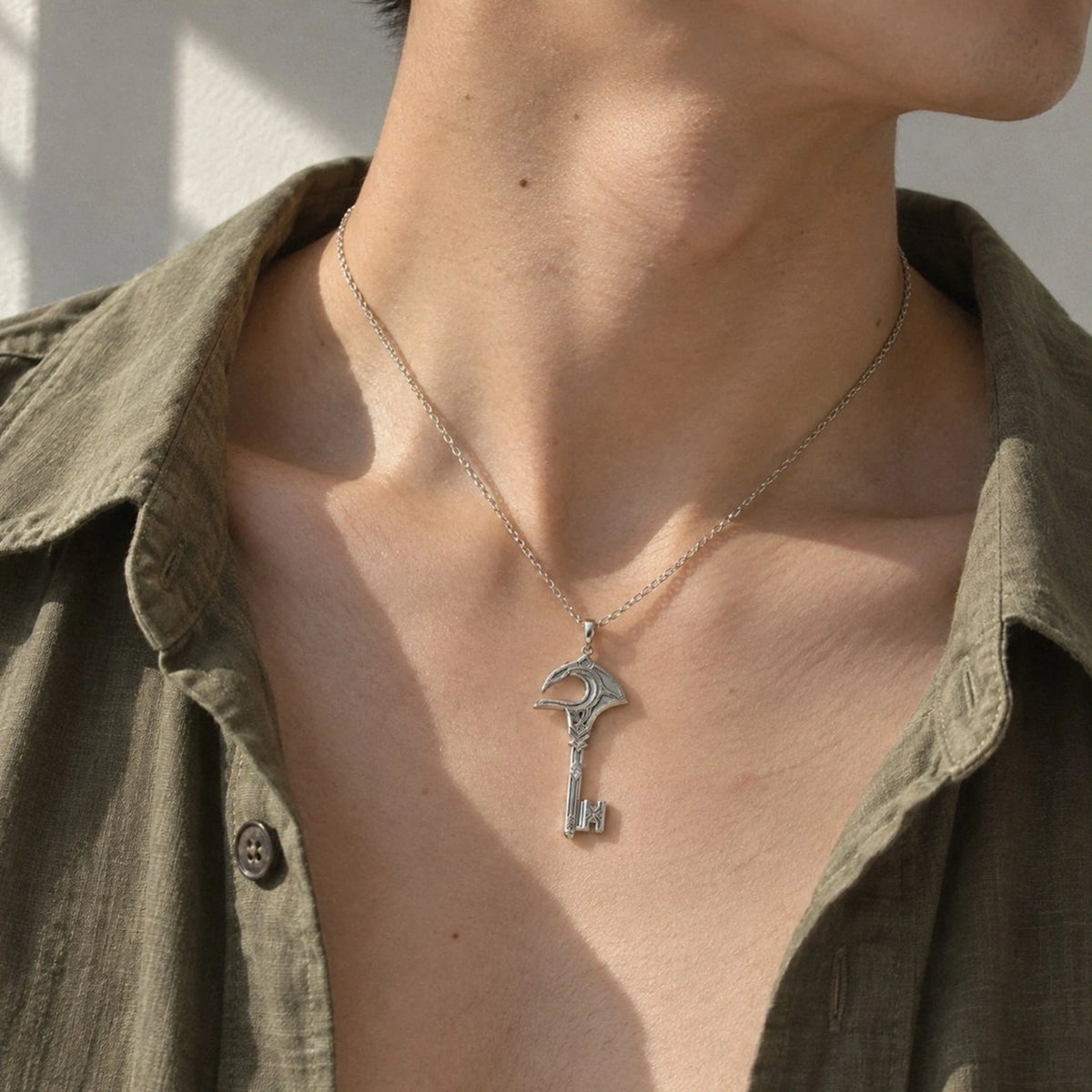 Alhaitham Necklace model wearing the silver pendant