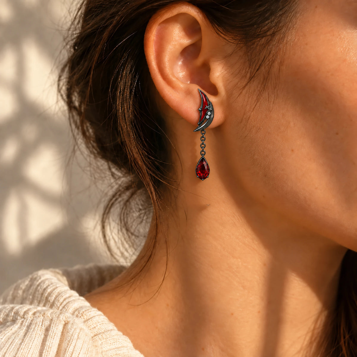 Arlecchino Earrings in black, worn on a model