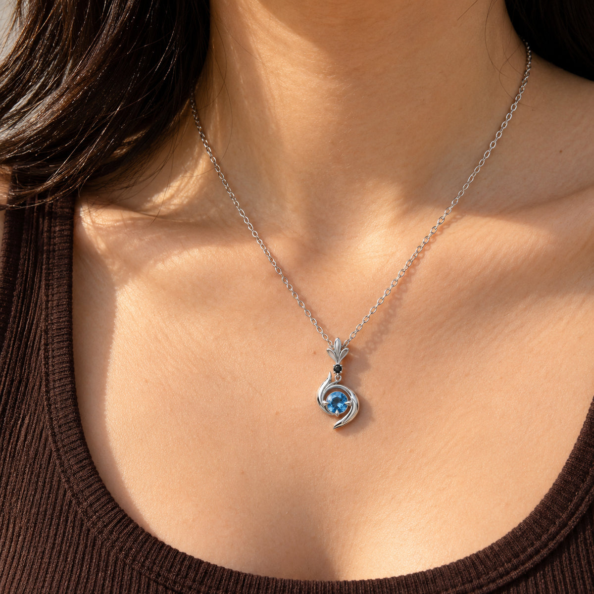 Aura Spike Necklace in silver, worn