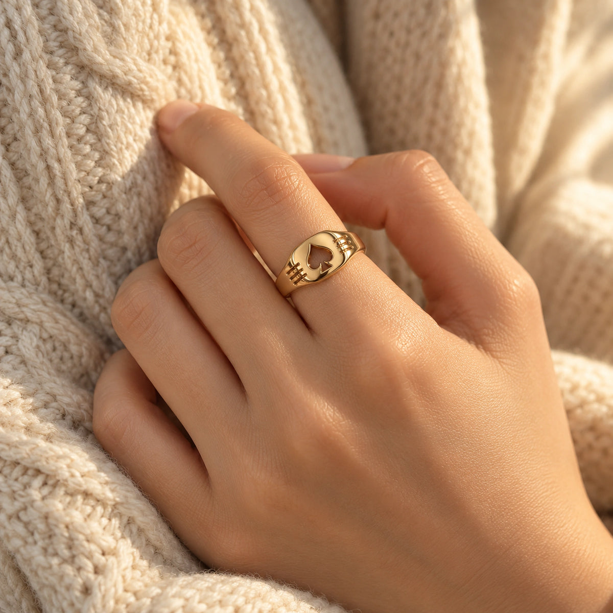 Aventurine Edge of Fortune Ring in gold, worn on a woman's hand