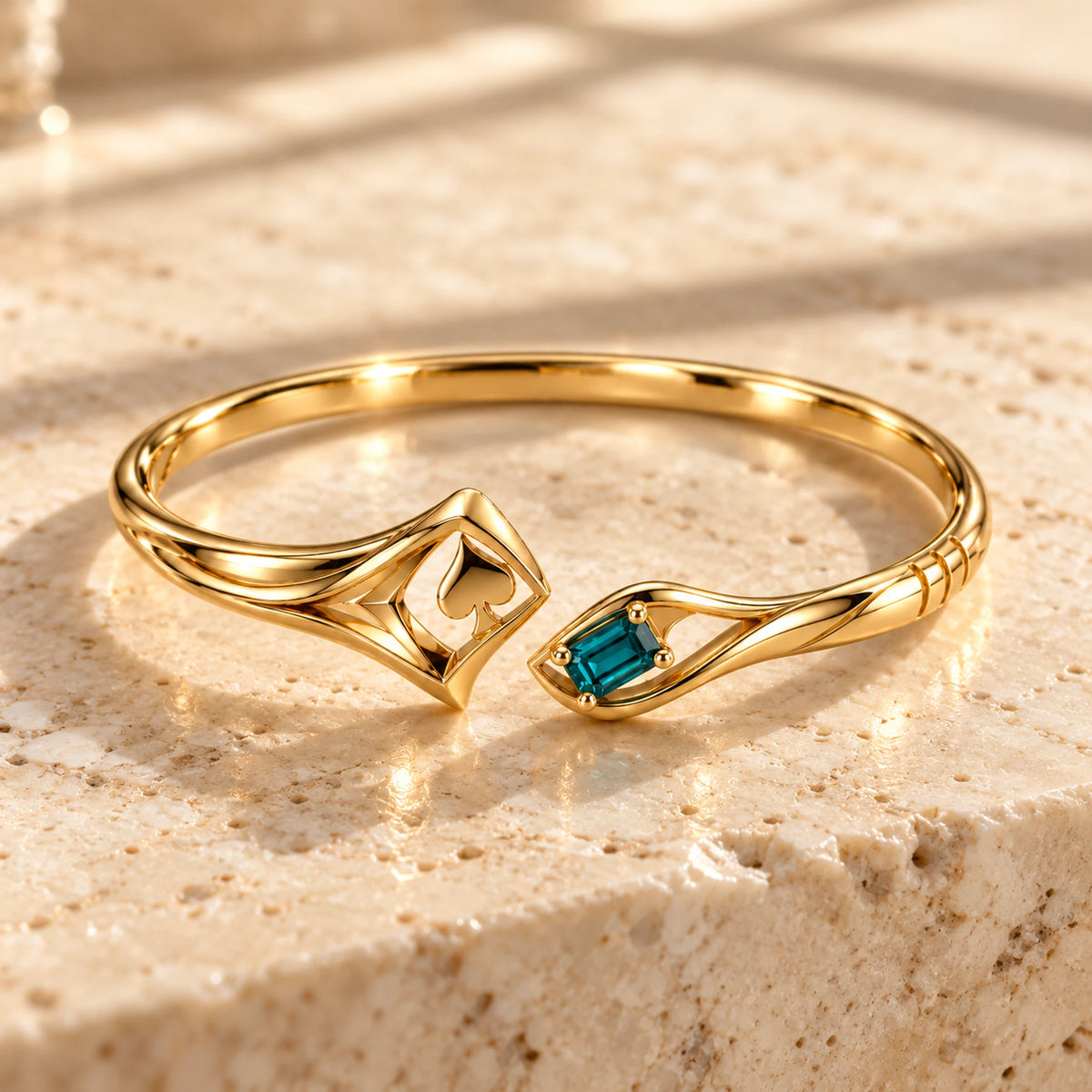 Aventurine Quiet Risk Bracelet in gold, on warm stone in daylight