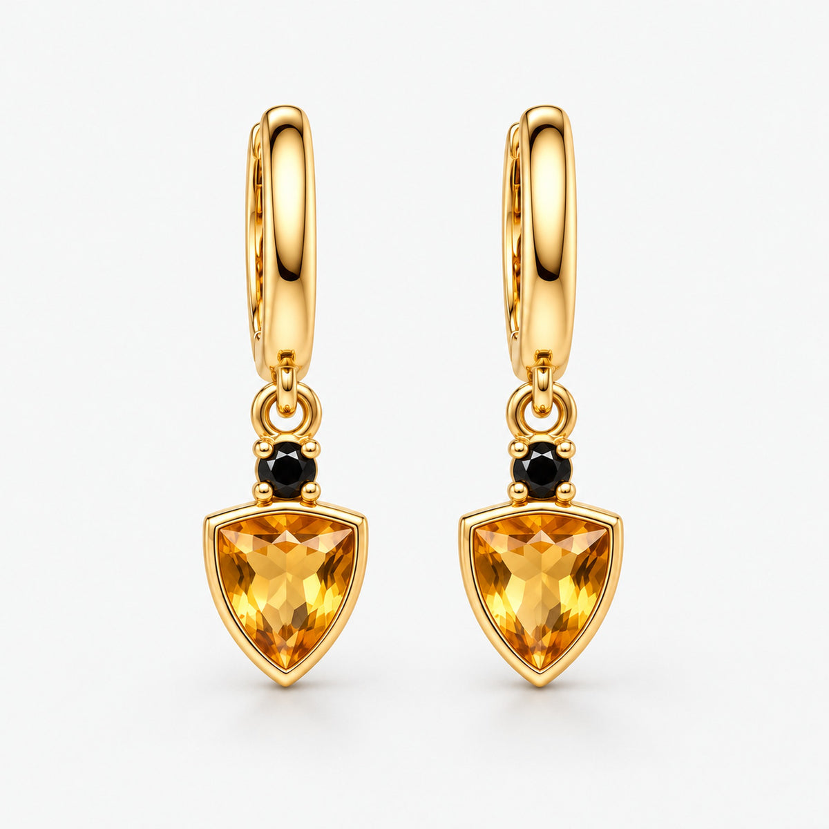 Badger Shield Huggie Earrings in gold, front view