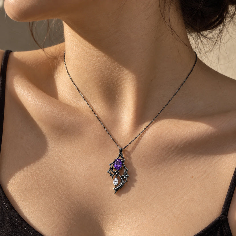 Black Swan Memoria Necklace in Royal Black worn at the collarbone