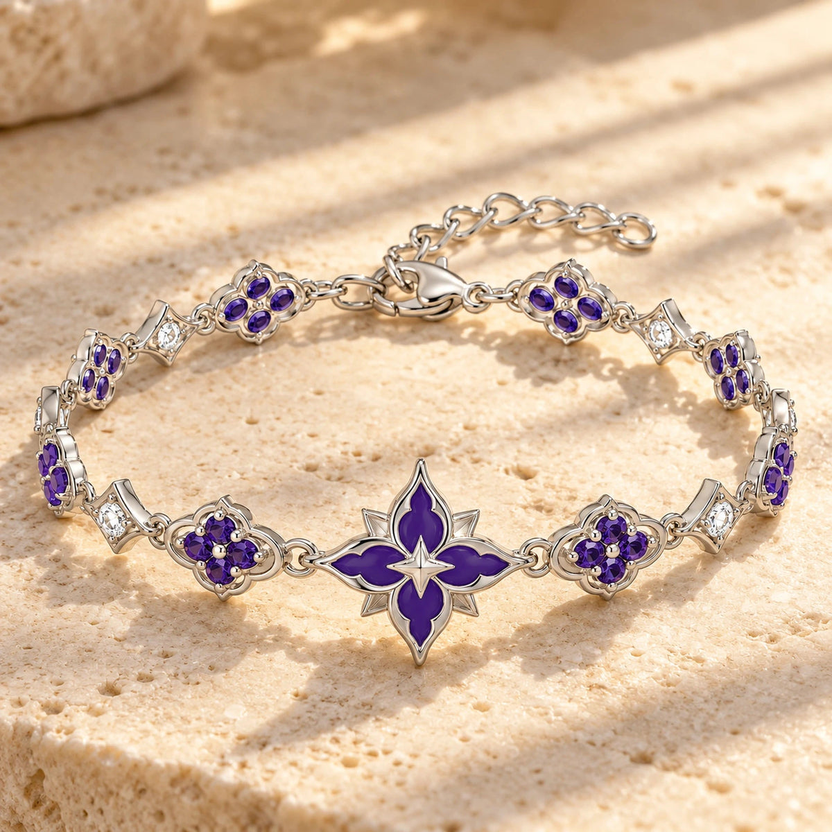 Black Swan Violet Star Bracelet in silver, on warm stone in daylight