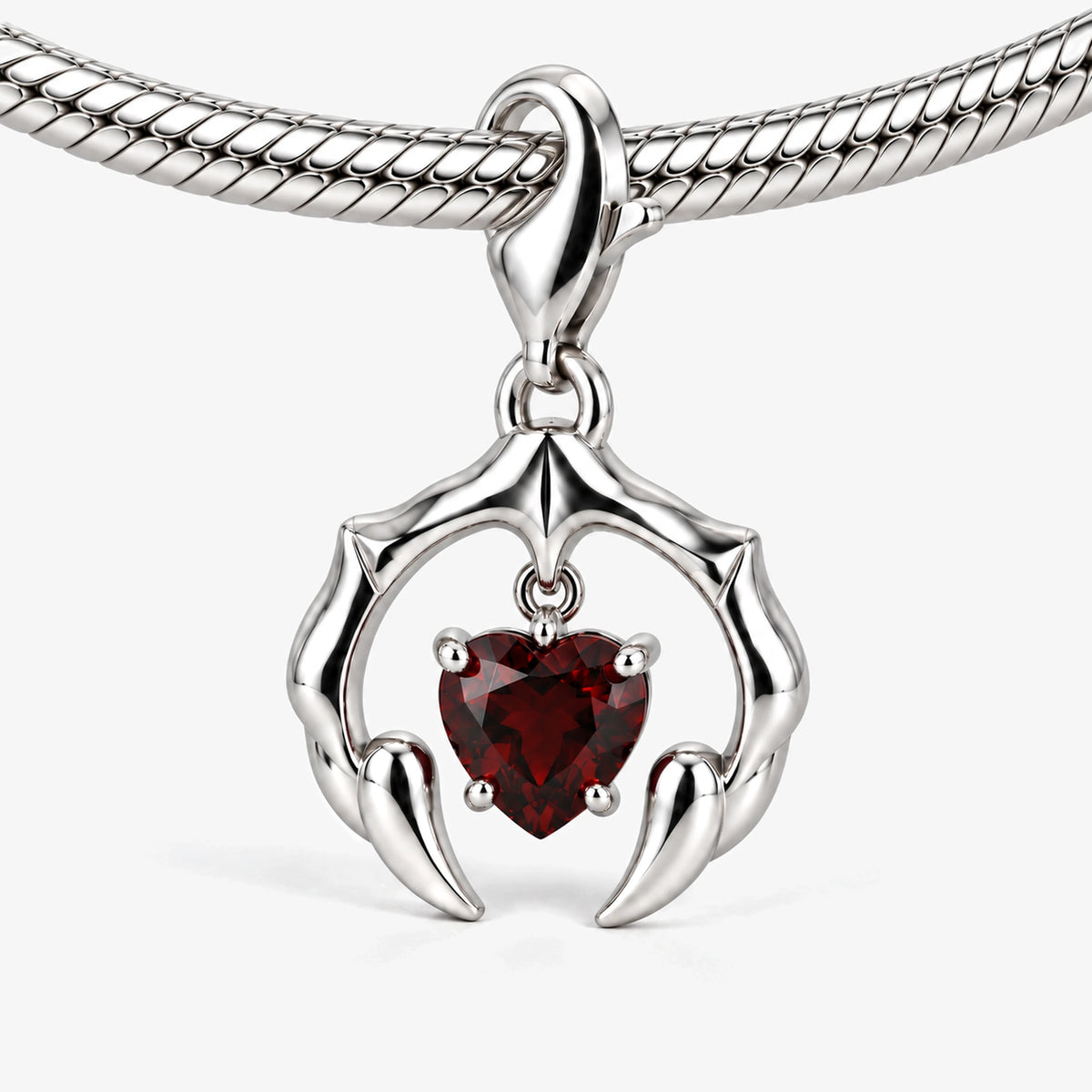Blood Bond Charm in Silver, on the silver snake-chain charm bracelet
