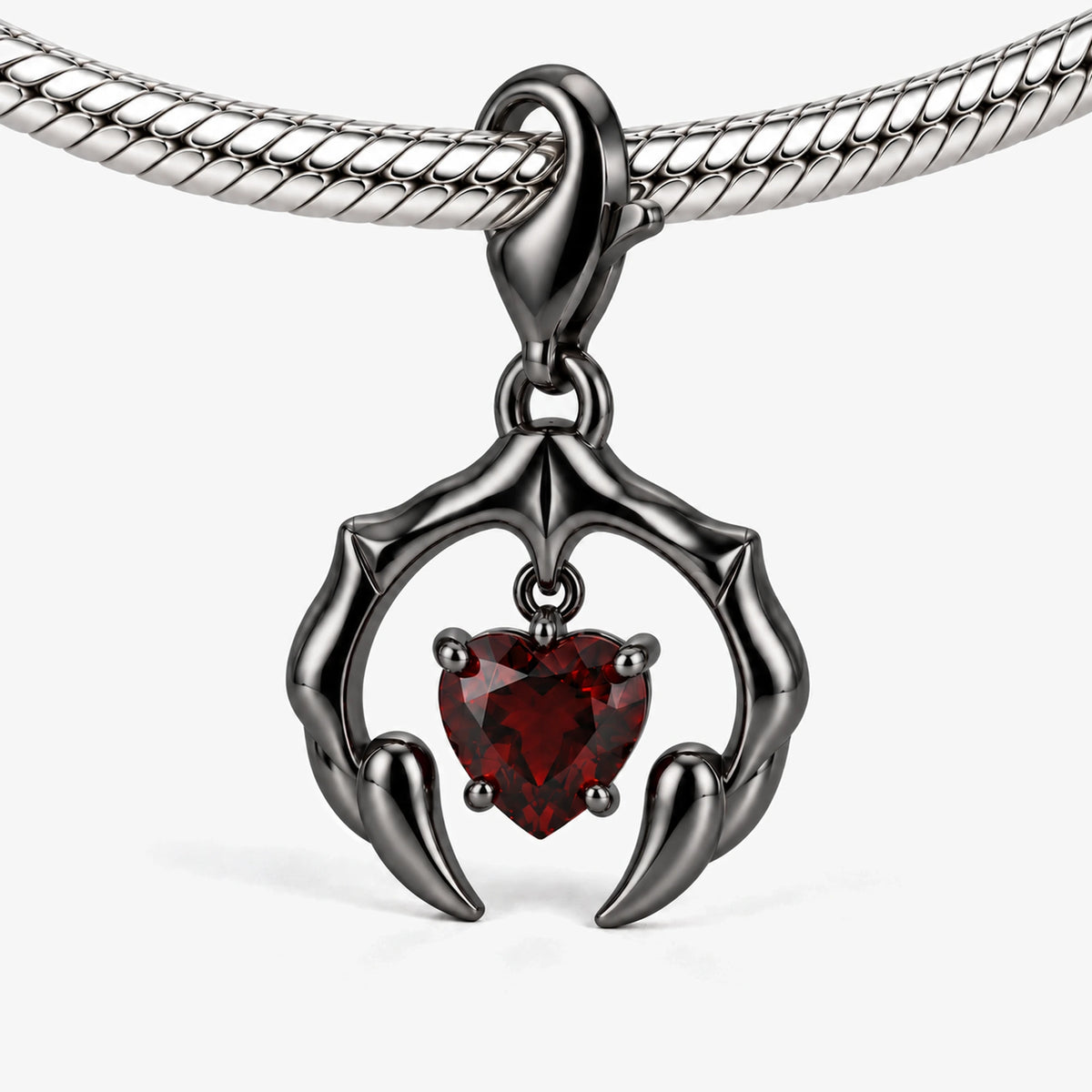 Blood Bond Charm in Royal Black, on the silver snake-chain charm bracelet