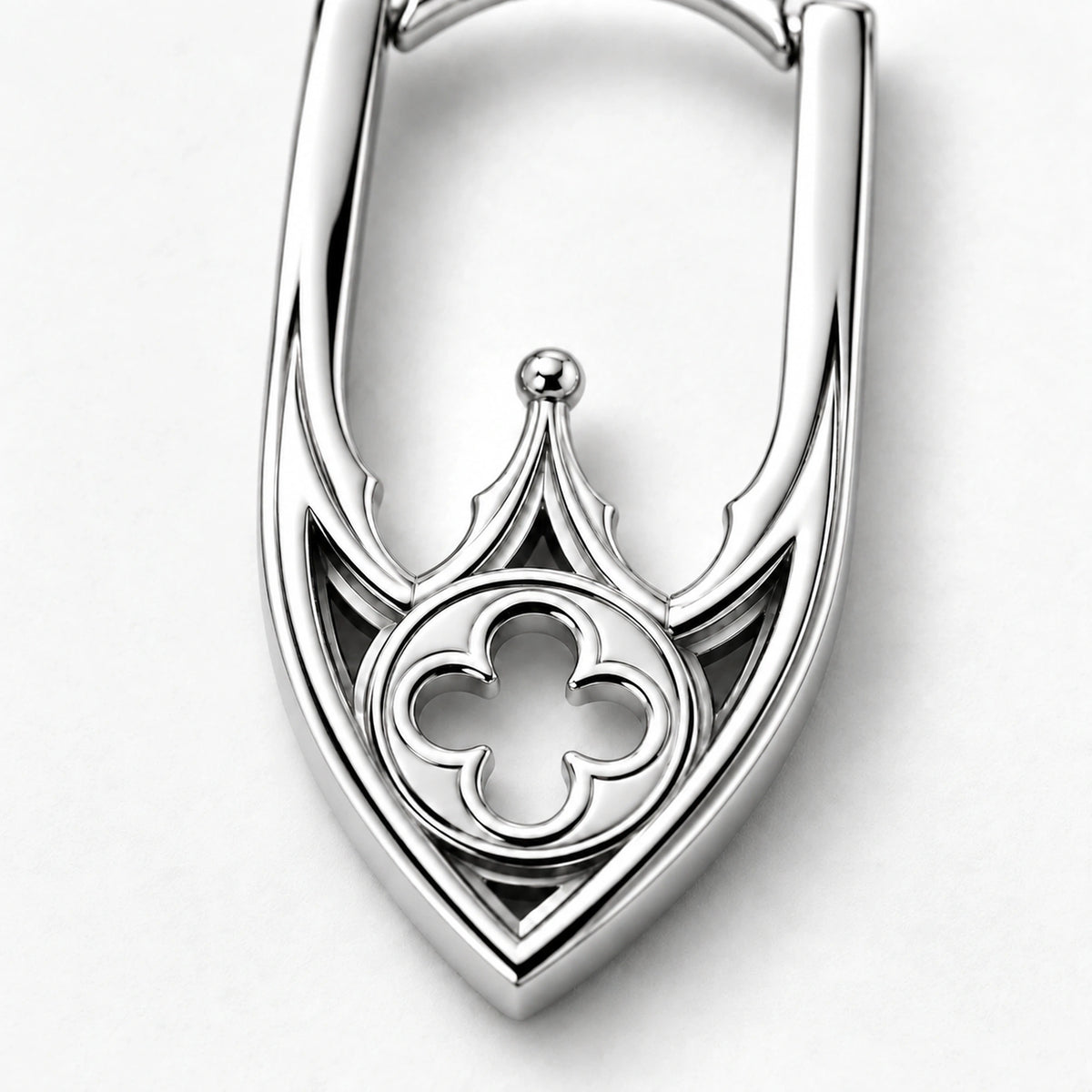 Cathedral Arch Hoop Earrings in silver, close-up of the quatrefoil medallion