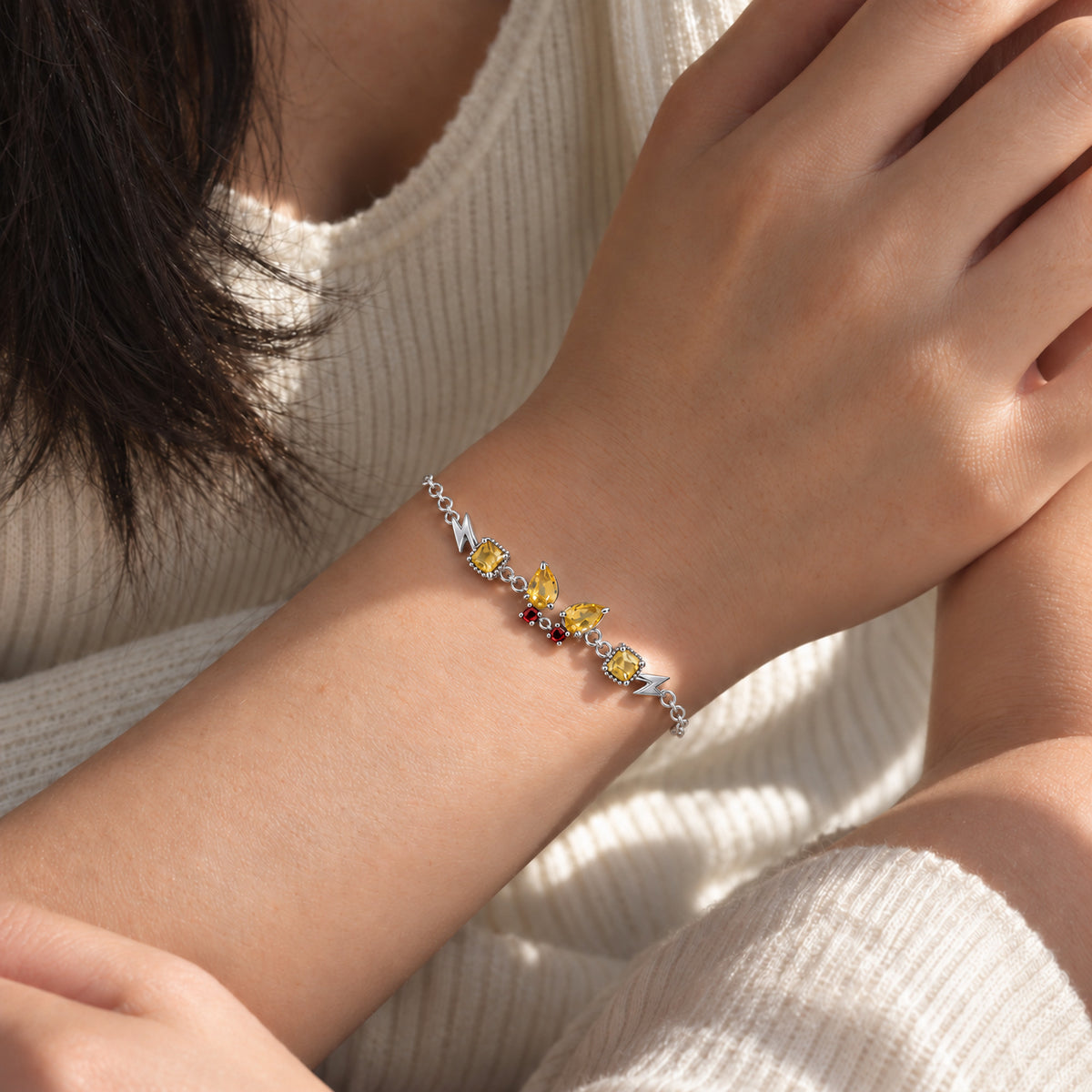 Cheek Spark Bracelet in silver, worn