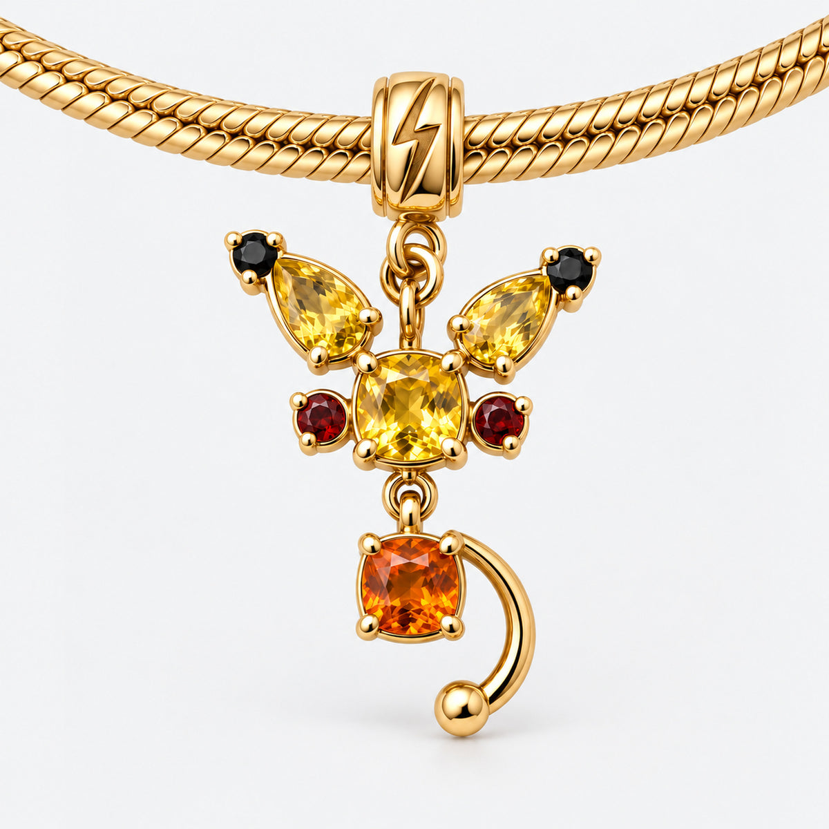Cheek Spark Charm in gold, on a charm bracelet