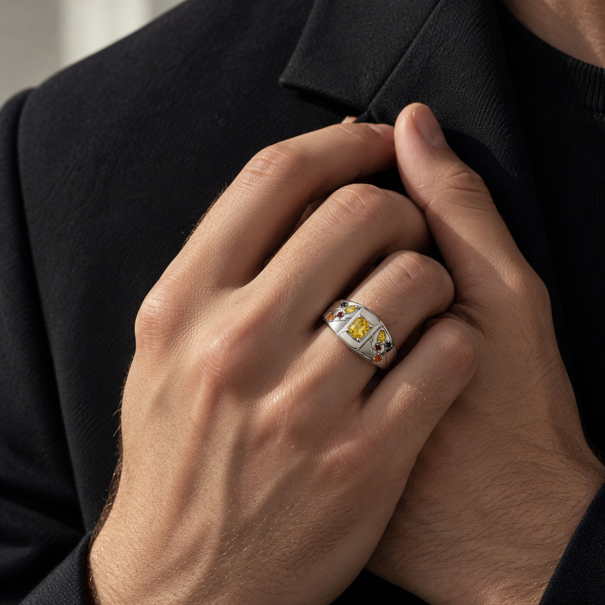 Cheek Spark Signet Ring in silver, worn by a man