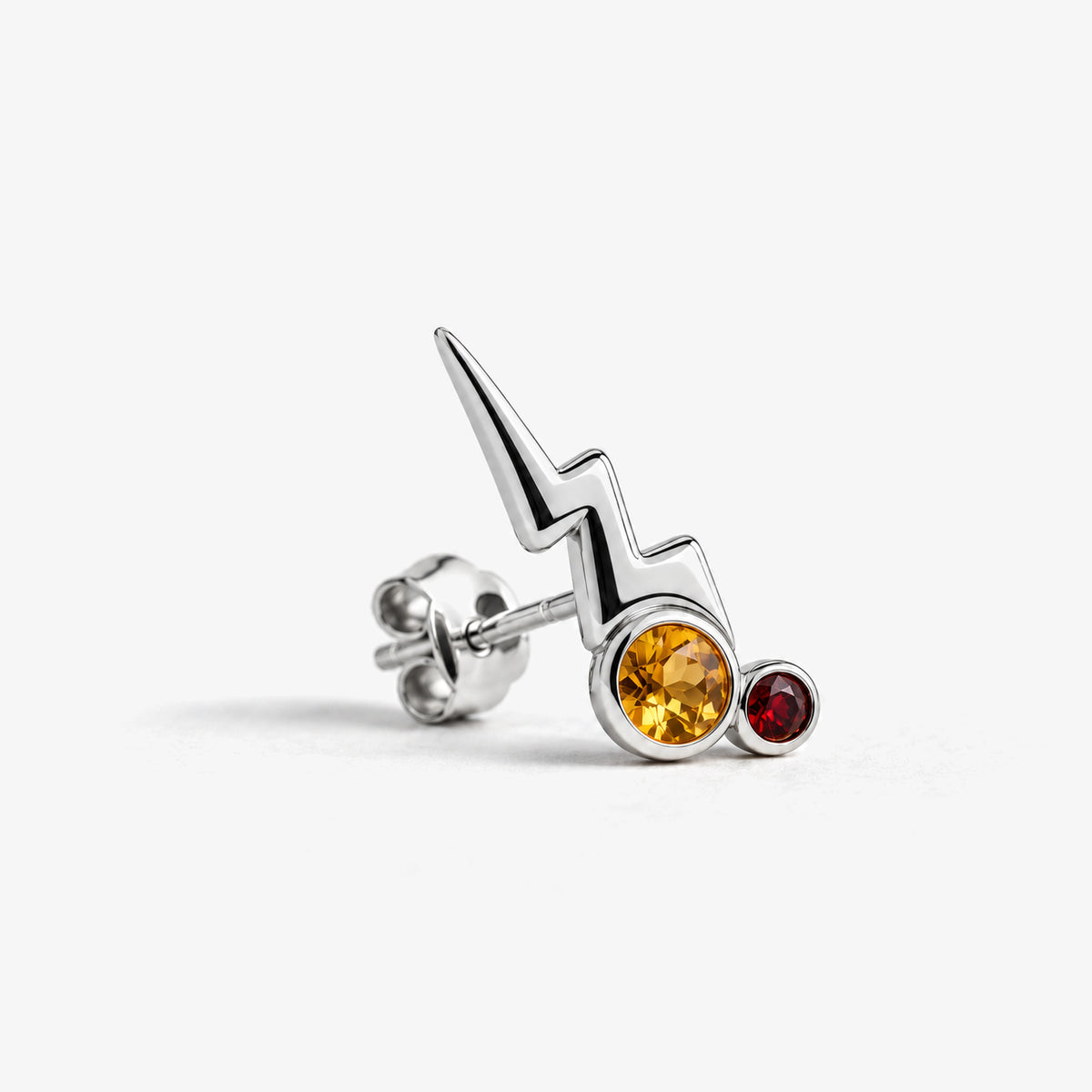 Cheek Spark Studs in silver, side view