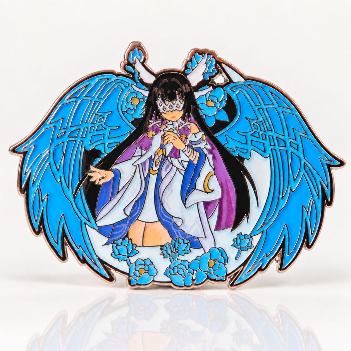 Columbina enamel pin upright on a white background with a soft reflection