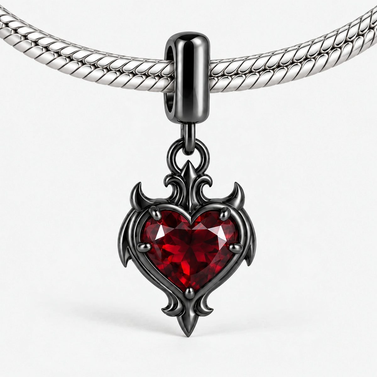 Blood Bond Heart Charm in Royal Black, on our silver snake-chain charm bracelet