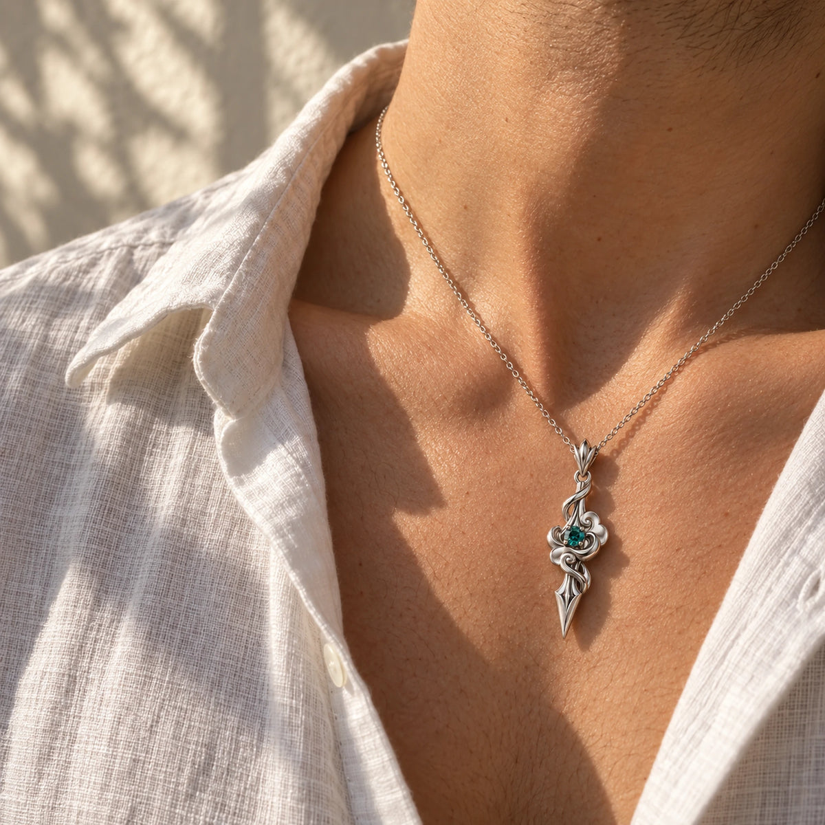 Dan Heng Cloud Spear Necklace in silver, worn by a man