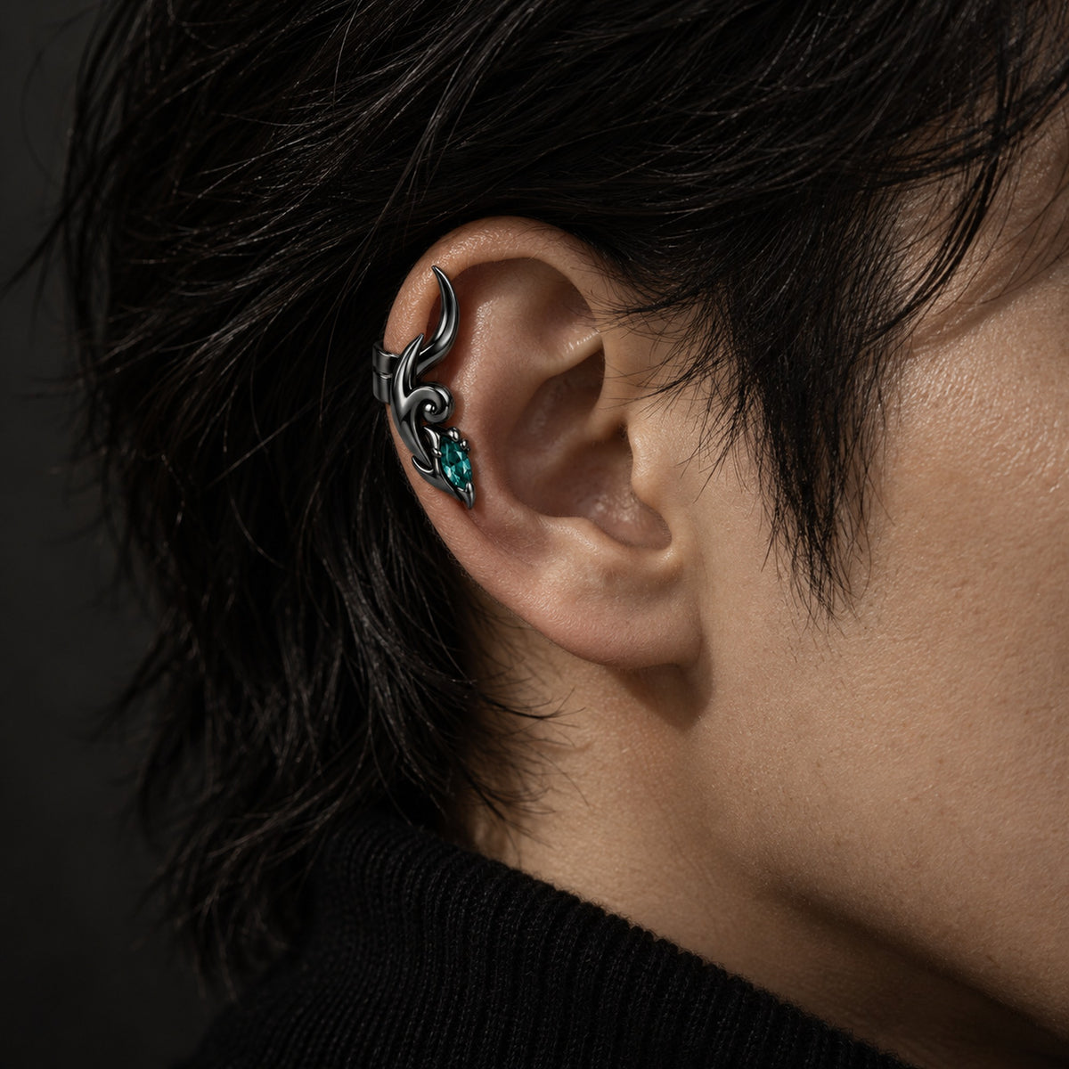 Dan Heng Dragon Horn Ear Cuffs in Royal Black, worn on a man's ear