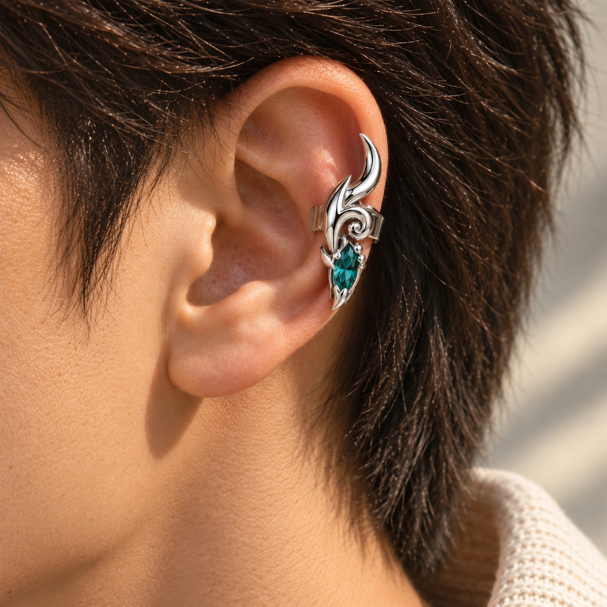 Dan Heng Dragon Horn Ear Cuffs in silver, worn on a man's ear