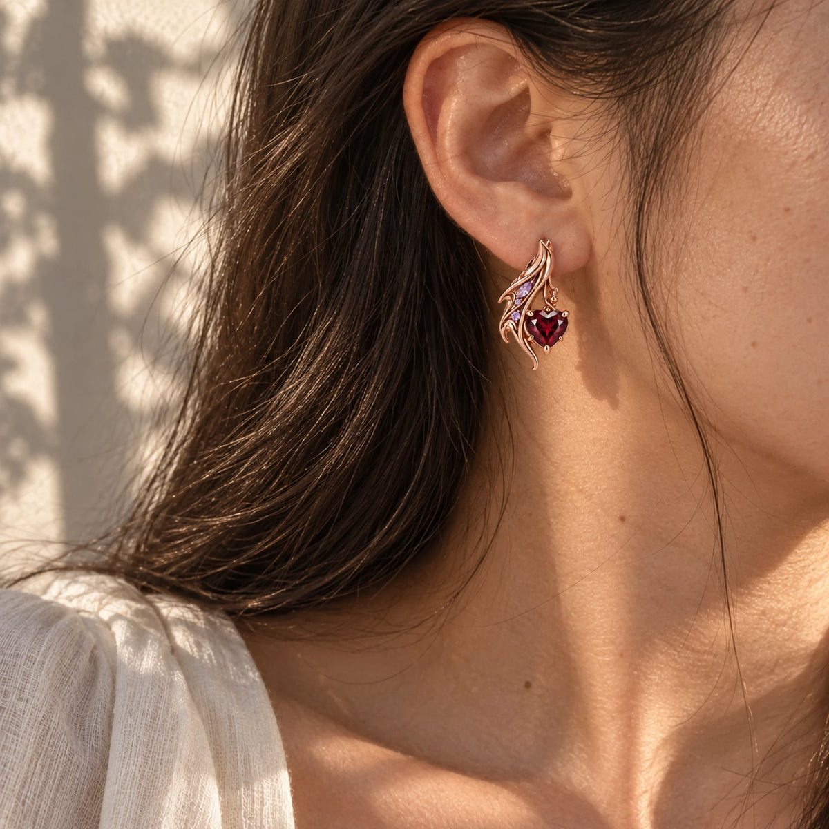 Durin Earrings in rose gold worn on the ear