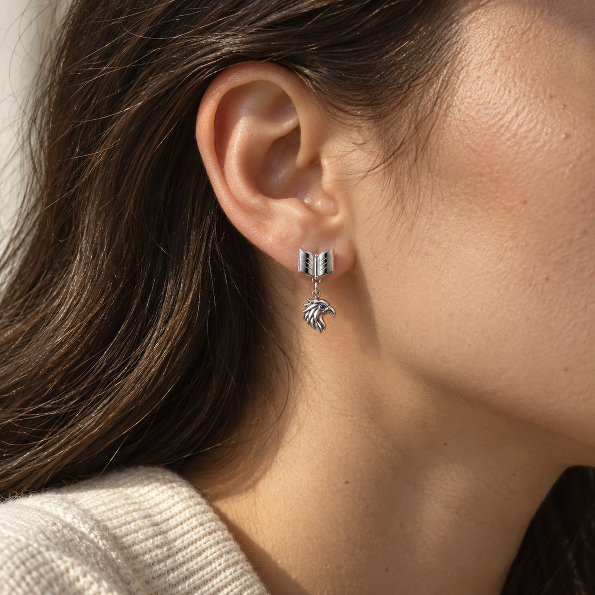Eagle Full Collection in silver, the earrings worn