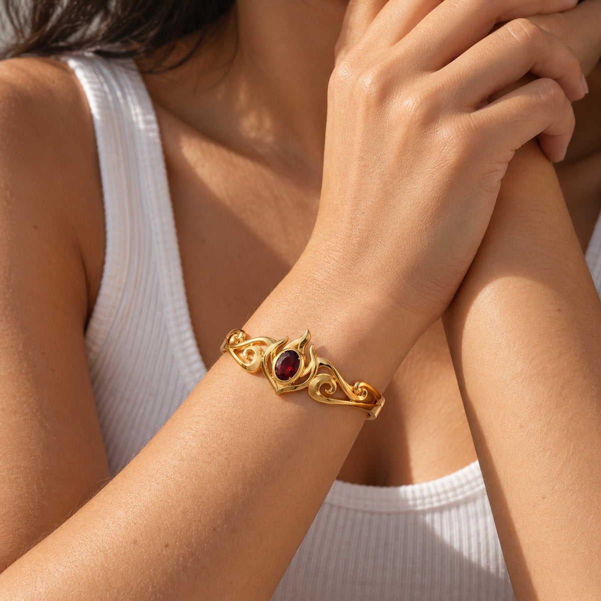 Fire Nation Insignia Cuff in gold, worn