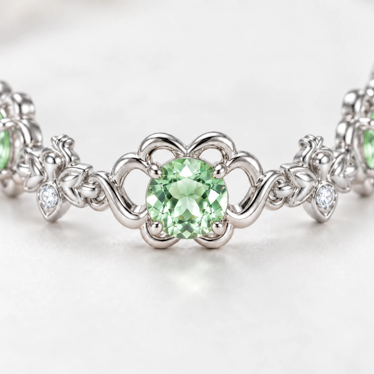 Firefly Bracelet, close-up of a mint-green stone and silver flower link