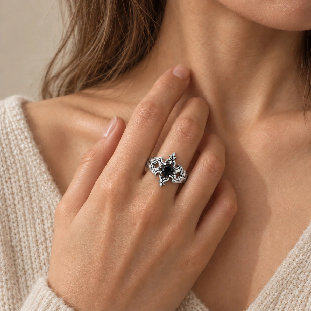 Midnight Fleur Cross Ring in silver, worn on the hand