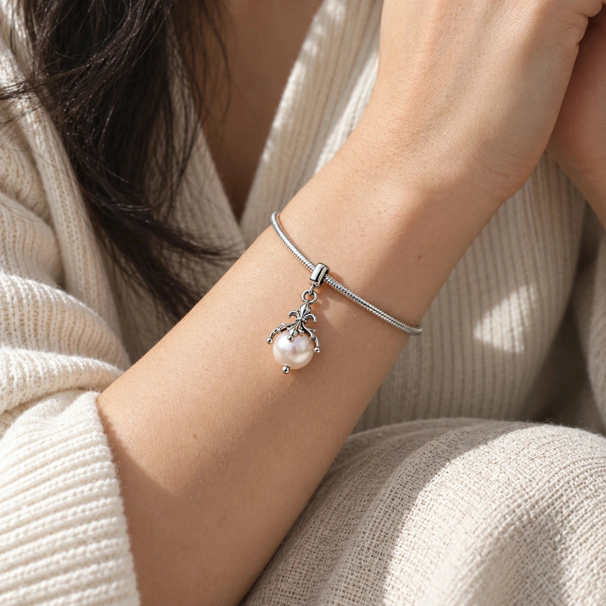 Shikon Jewel Charm in silver, worn