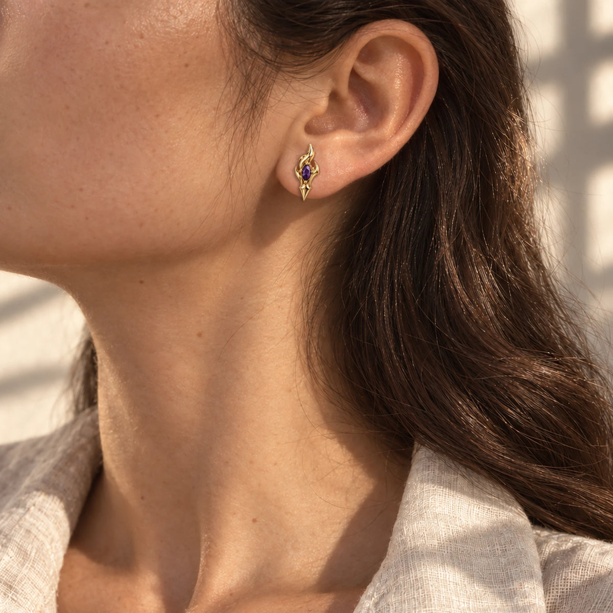 Flins Earrings in gold, worn