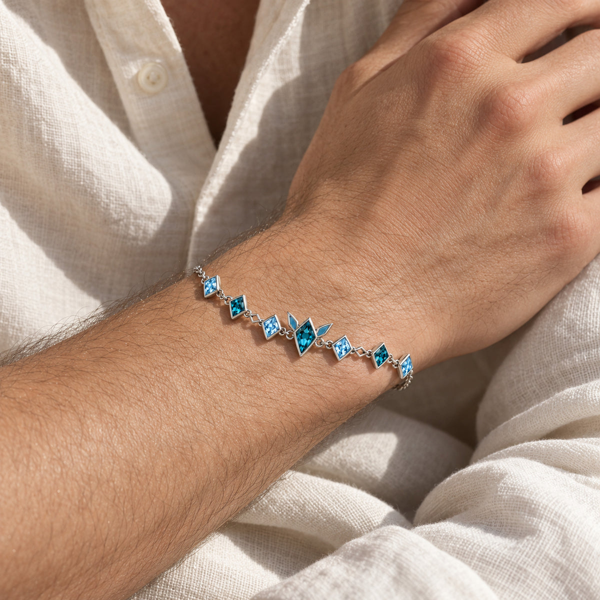 Frost Path Bracelet in silver, worn on a man's wrist