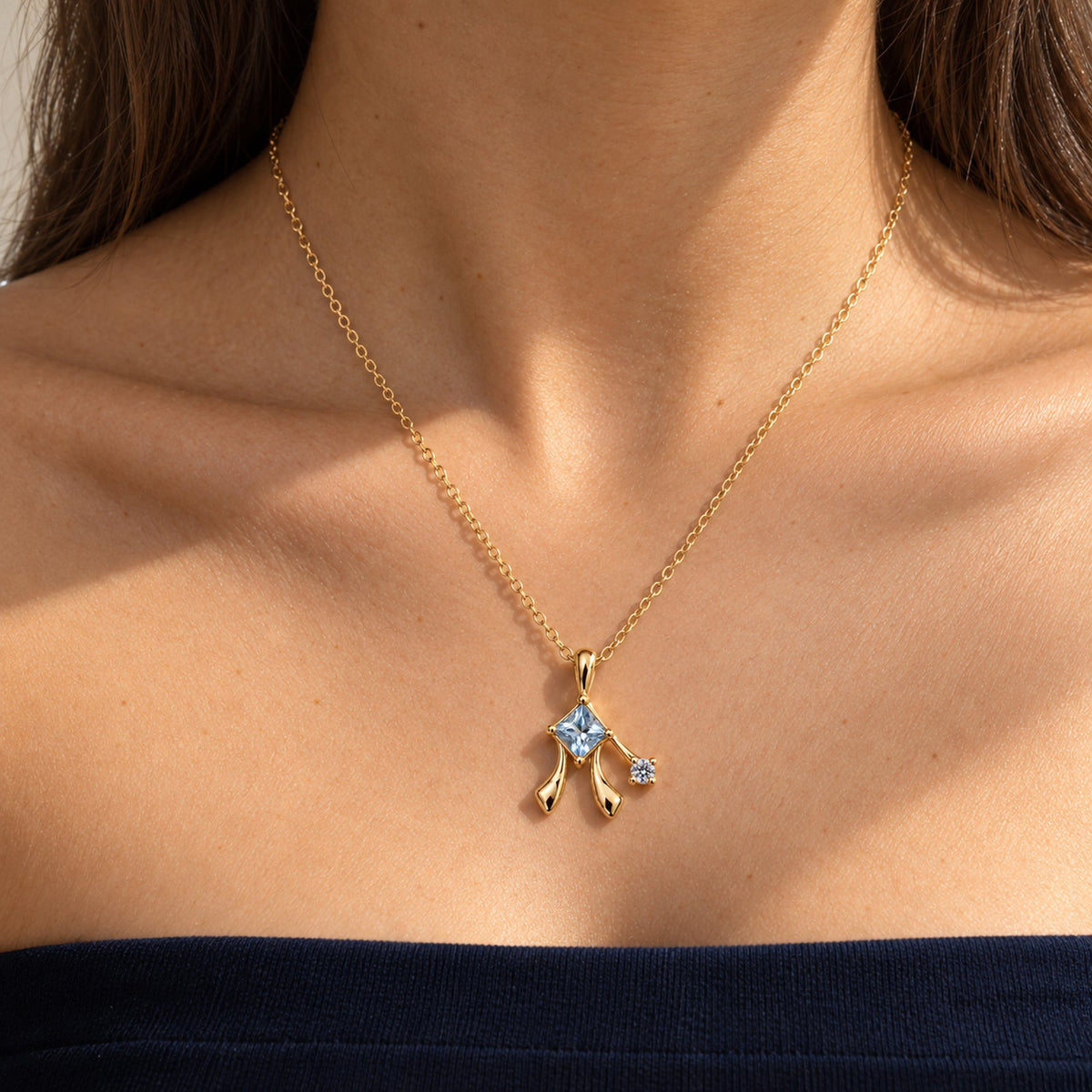 Frost Path Necklace in gold, worn