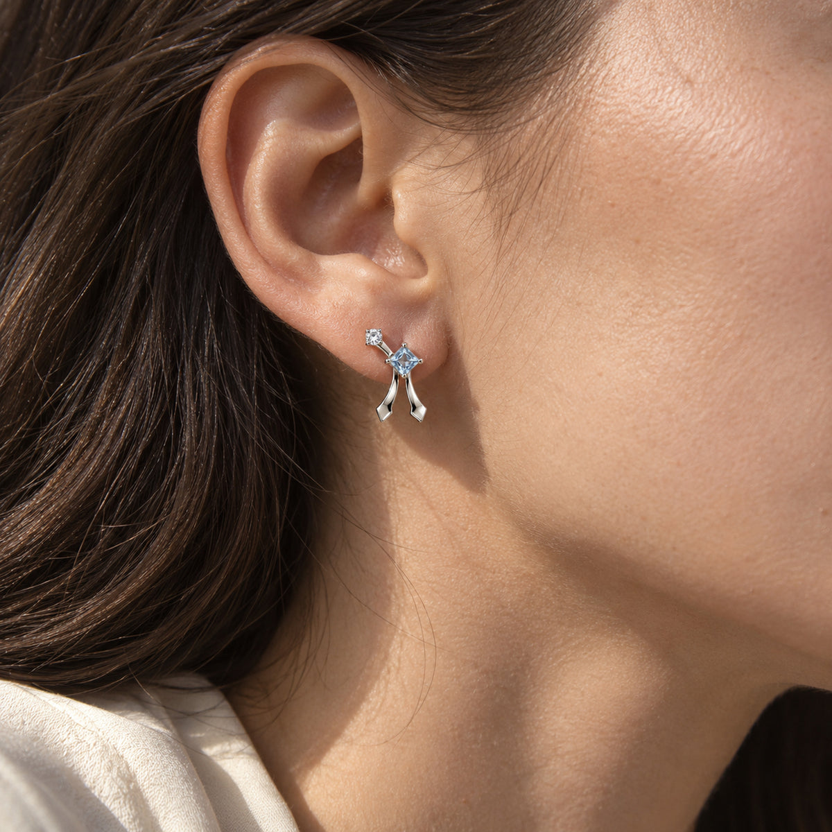 Frost Path Studs in silver, worn