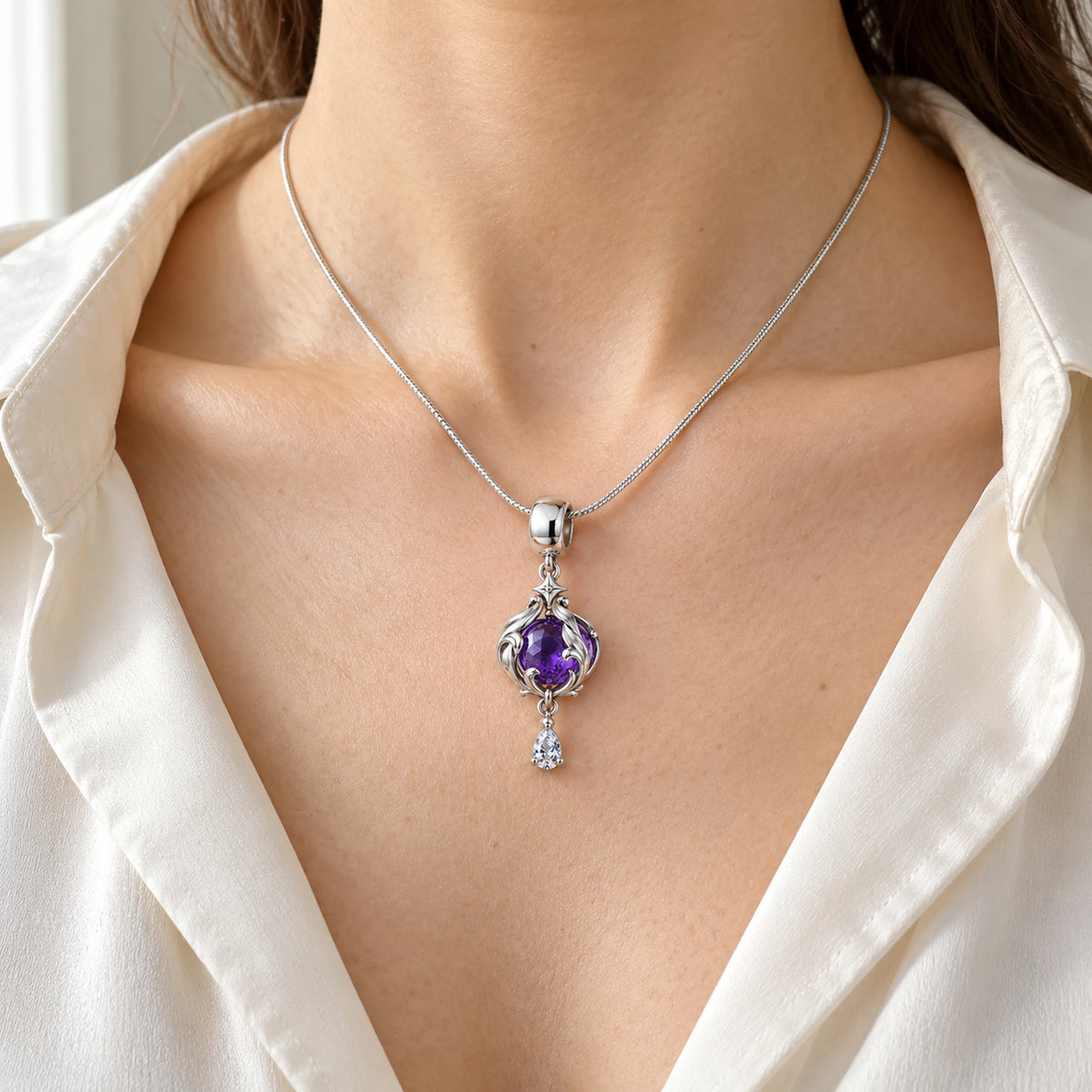 The free second Black Swan Memory Orb Charm worn on a simple silver chain necklace (chain not included)