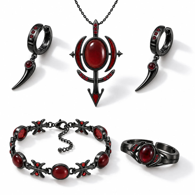 Full Blood Manipulation Jewelry Collection in Royal Black: arrow pendant necklace, blade drop huggie earrings, cross link bracelet and ring with red stones