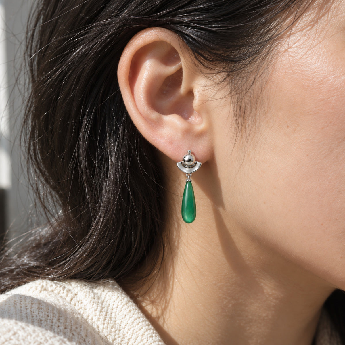 Poison Taster Earrings in silver, worn