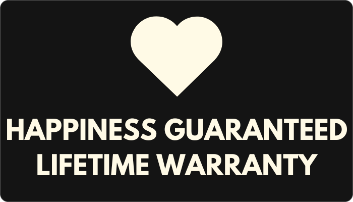 Black card with a white heart and text 'Happiness Guaranteed Lifetime Warranty' on a black background