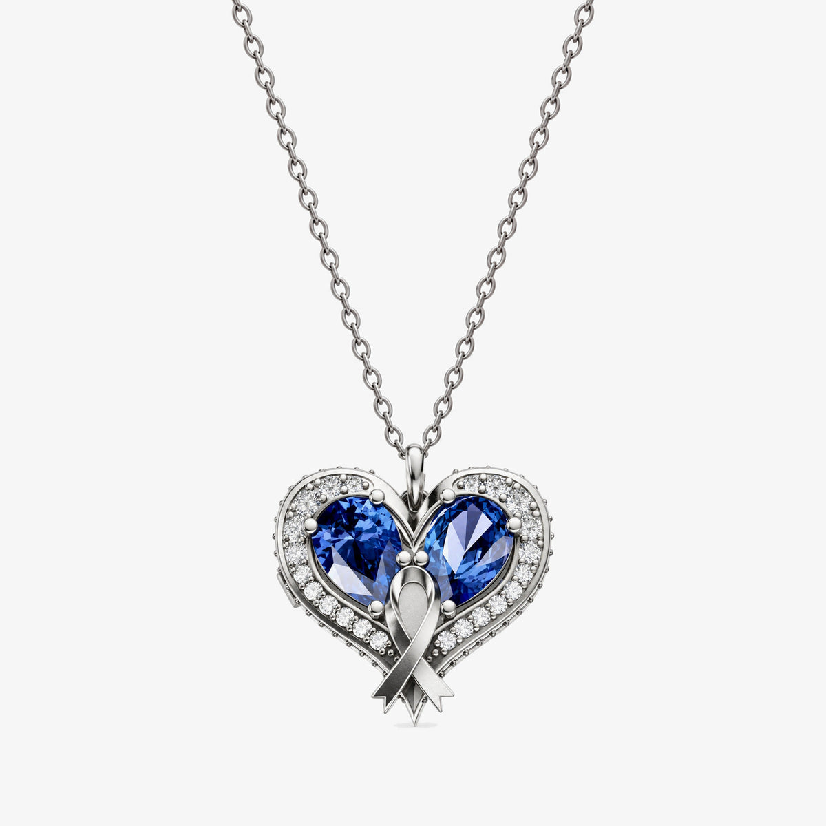 Heart Locket Pendant in silver, front view, with two blue stones and a ribbon down the center