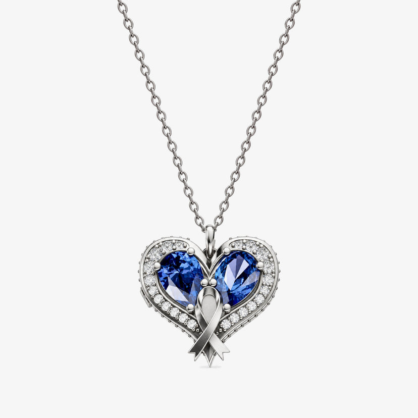 Heart Locket Pendant in silver, front view, with two blue stones and a ribbon down the center