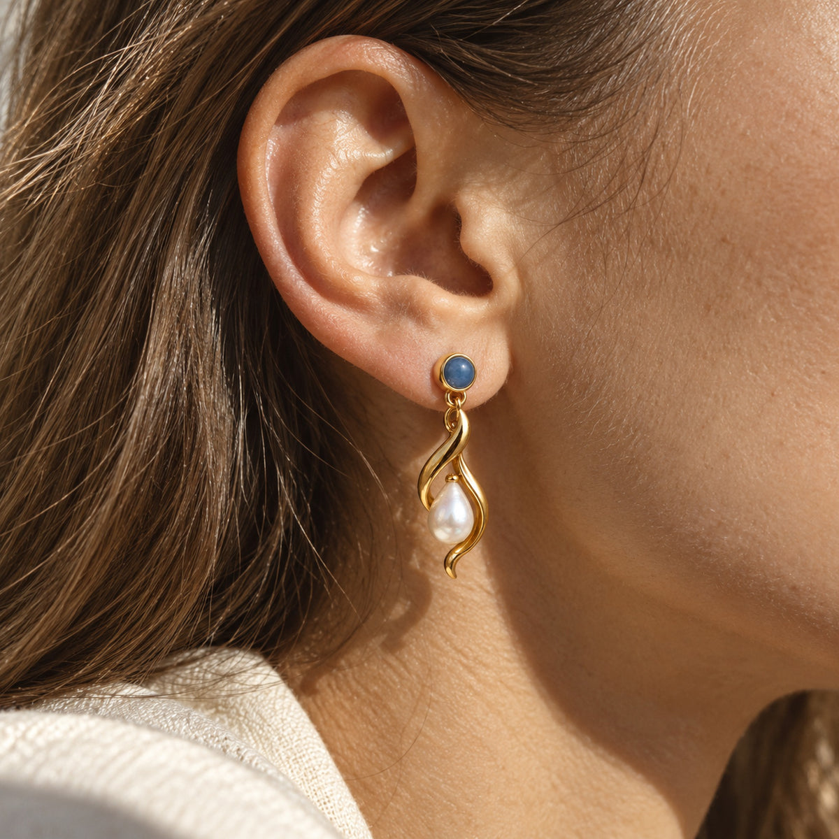Inherited Tide Pearl Drop Earrings in gold, worn
