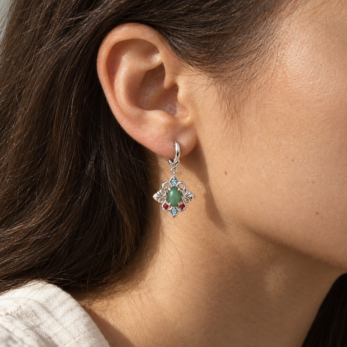 Jade Pavilion Full Collection in silver, the earrings worn