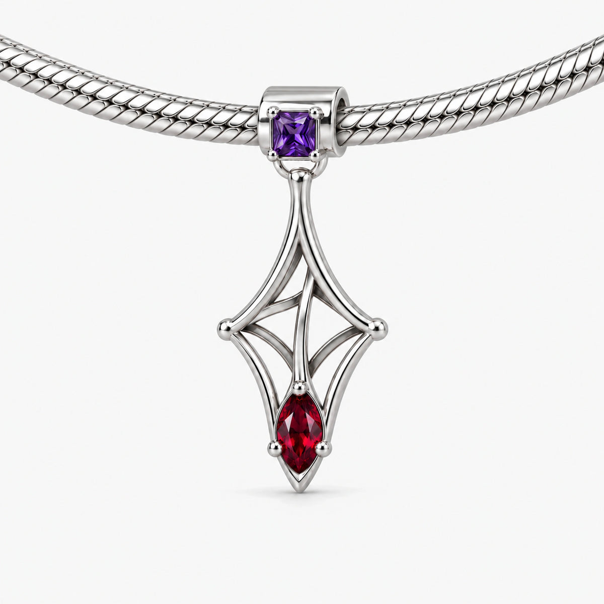 Kafka Little Strand Charm in silver on a snake chain bracelet