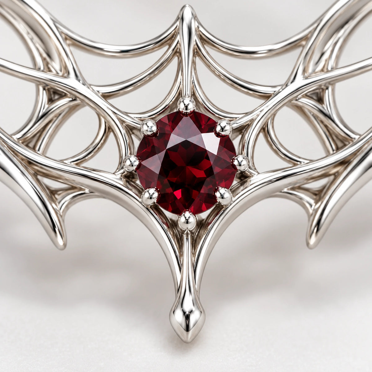 Kafka Silk Contract Necklace, close-up of the web and wine-red stone