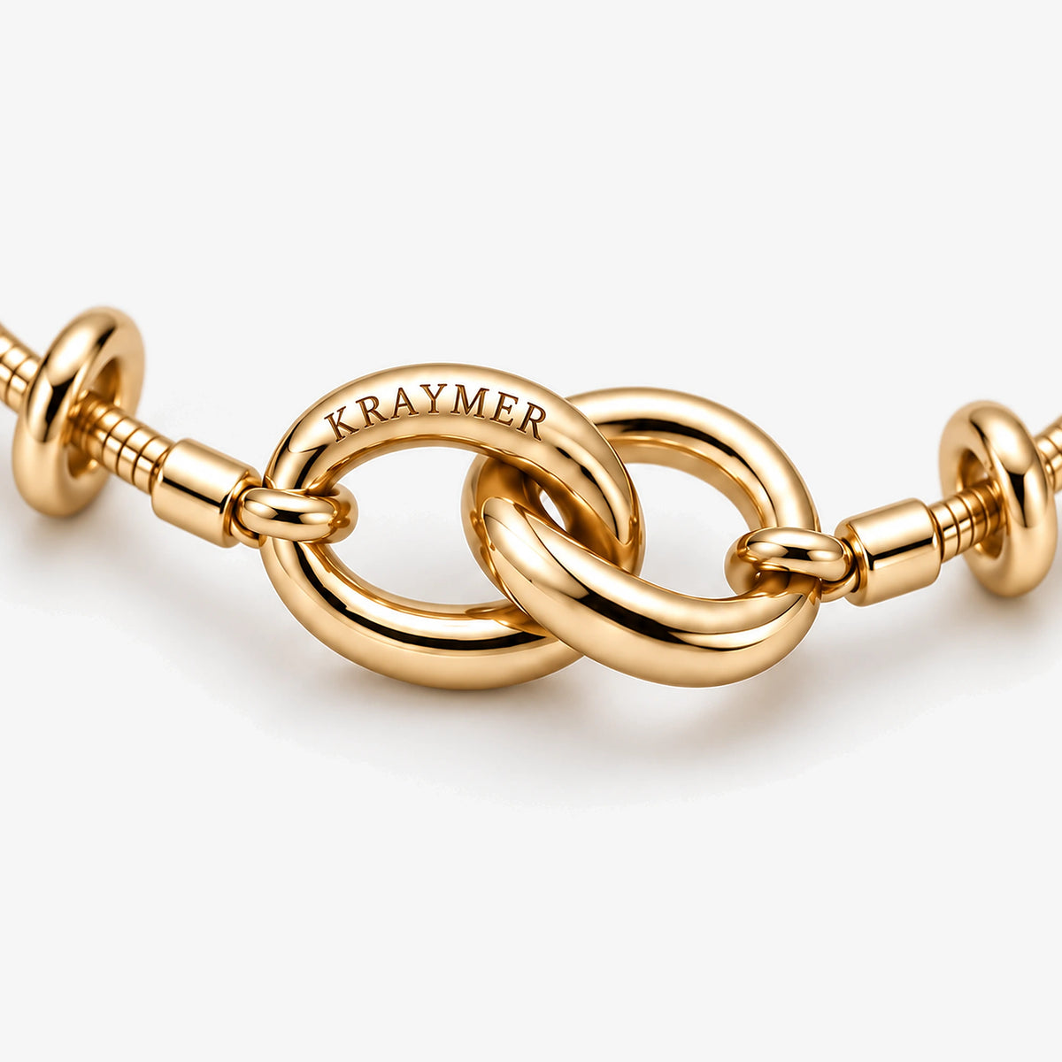 Kraymer Charm Bracelet in gold, close-up