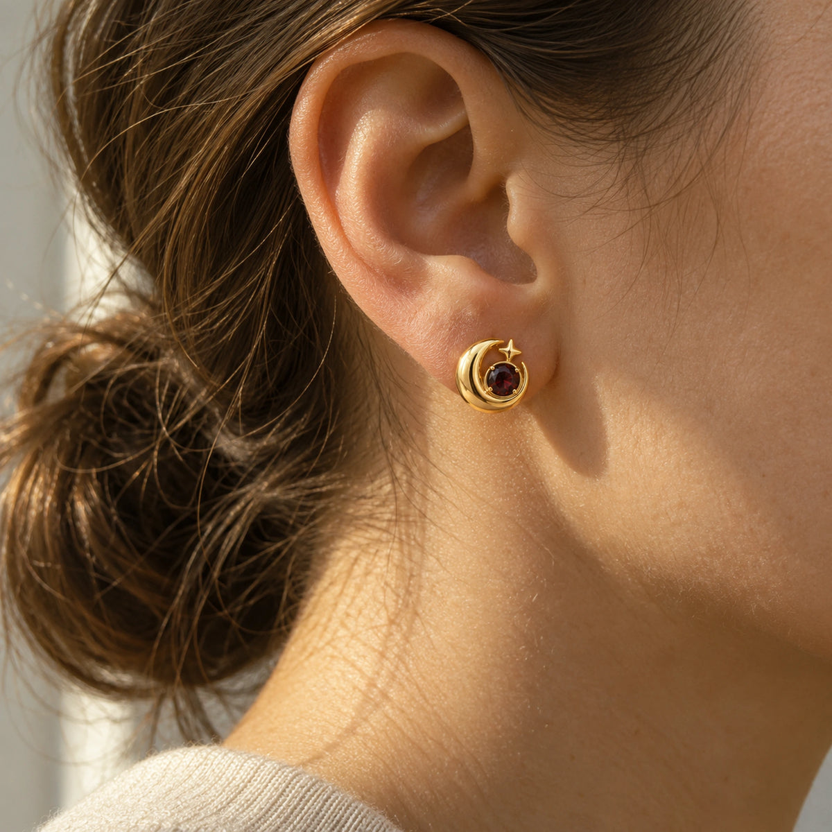 Eclipse Waltz Studs in gold, worn